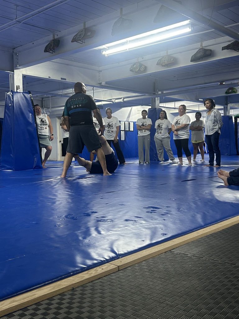 Leonardo Lechuga leads instruction during a women’s self-defense seminar at North Georgia Hayastan MMA Academy in Dalton, Georgia
